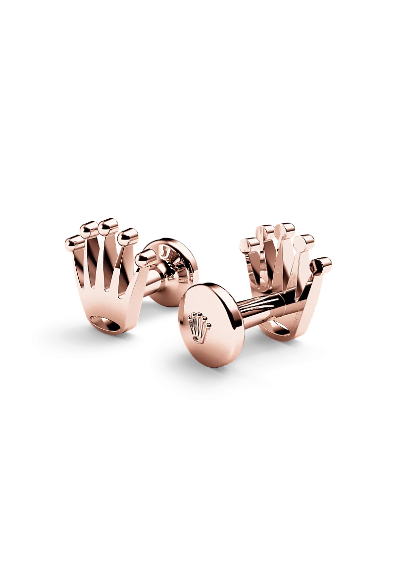 Rolex ‘Crown’ cufflinks in 18 kt everose gold with a  dial,  bezel, and  bracelet.