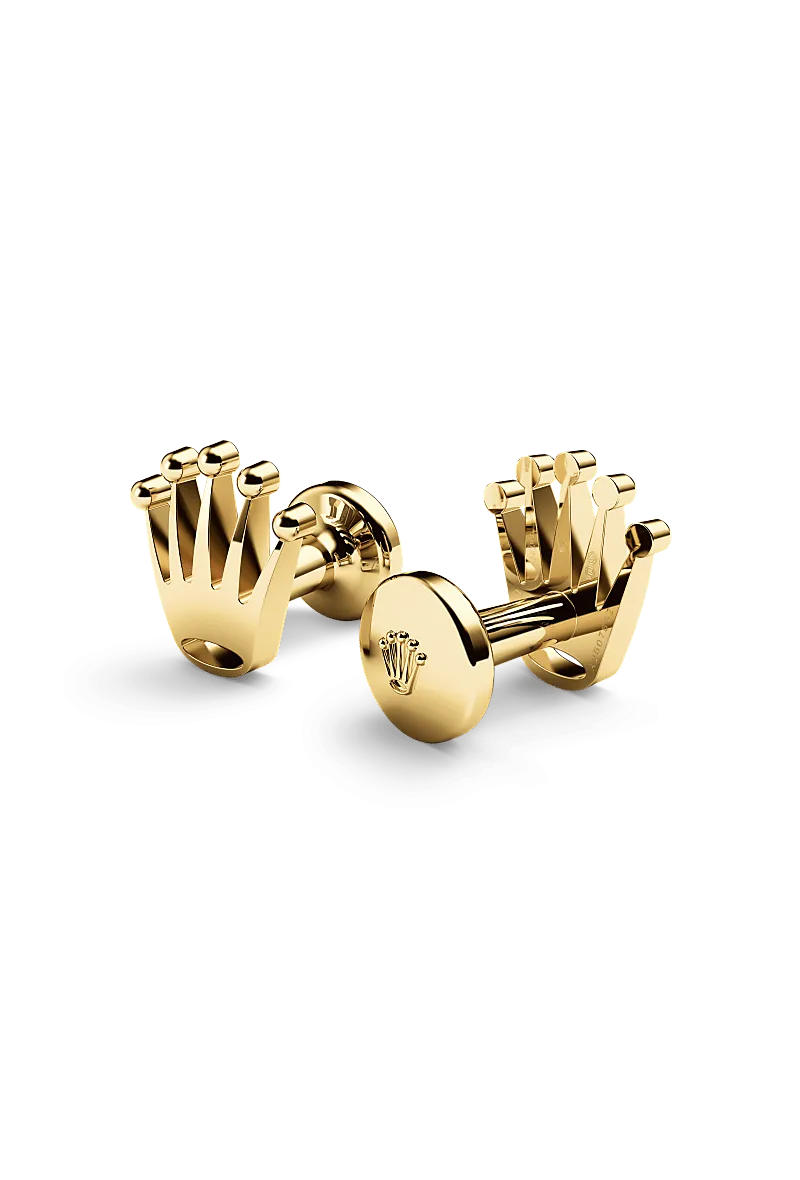 Rolex ‘Crown’ cufflinks in 18 kt yellow gold with a  dial,  bezel, and  bracelet.