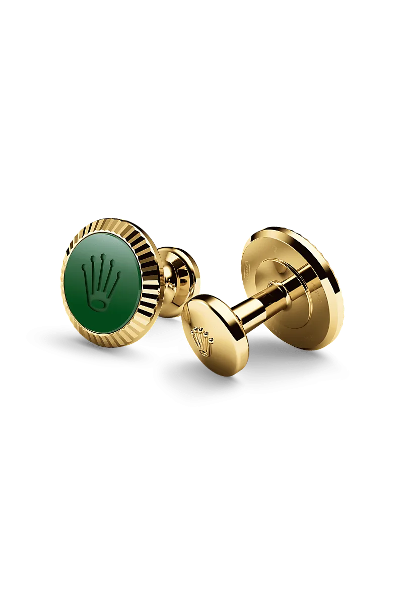 Rolex ‘Fluted’ cufflinks in 18 kt yellow gold with a  dial,  bezel, and  bracelet.