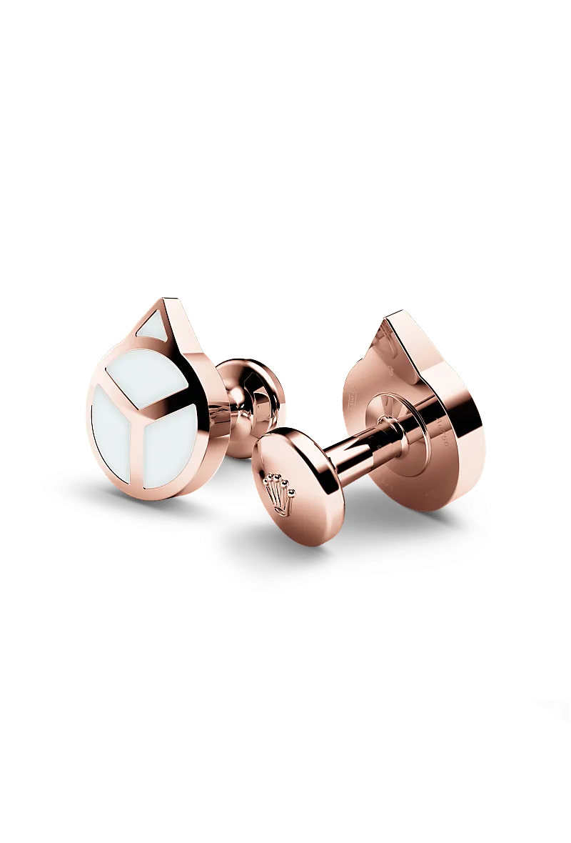 Rolex ‘Hand’ cufflinks in 18 kt everose gold with a  dial,  bezel, and  bracelet.