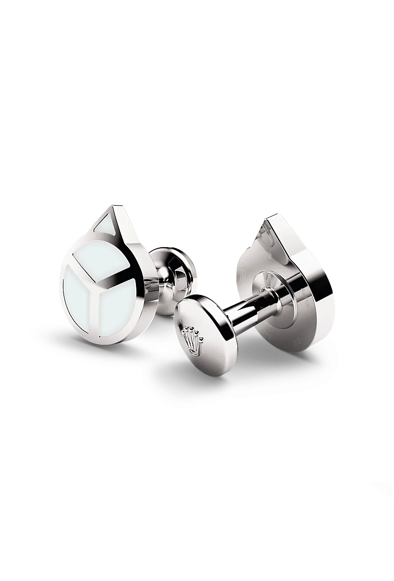 Rolex ‘Hand’ cufflinks in 18 kt white gold with a  dial,  bezel, and  bracelet.