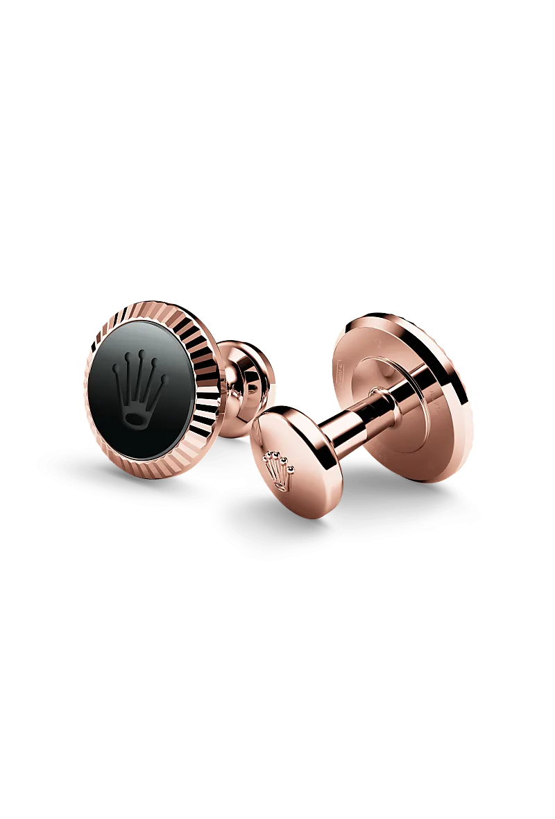 Rolex ‘Fluted’ cufflinks in 18 kt everose gold with a  dial,  bezel, and  bracelet.