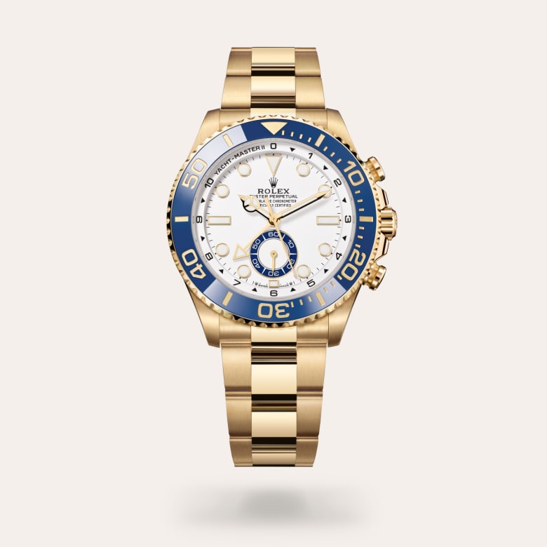 Rolex Yacht-Master II [M126688-0001] in 18 ct yellow gold with a white dial, bidirectional rotatable 60-minute graduated bezel with blue cerachrom insert in ceramic. moulded, recessed graduations and numerals coated with gold bezel, and 18 ct yellow gold bracelet.