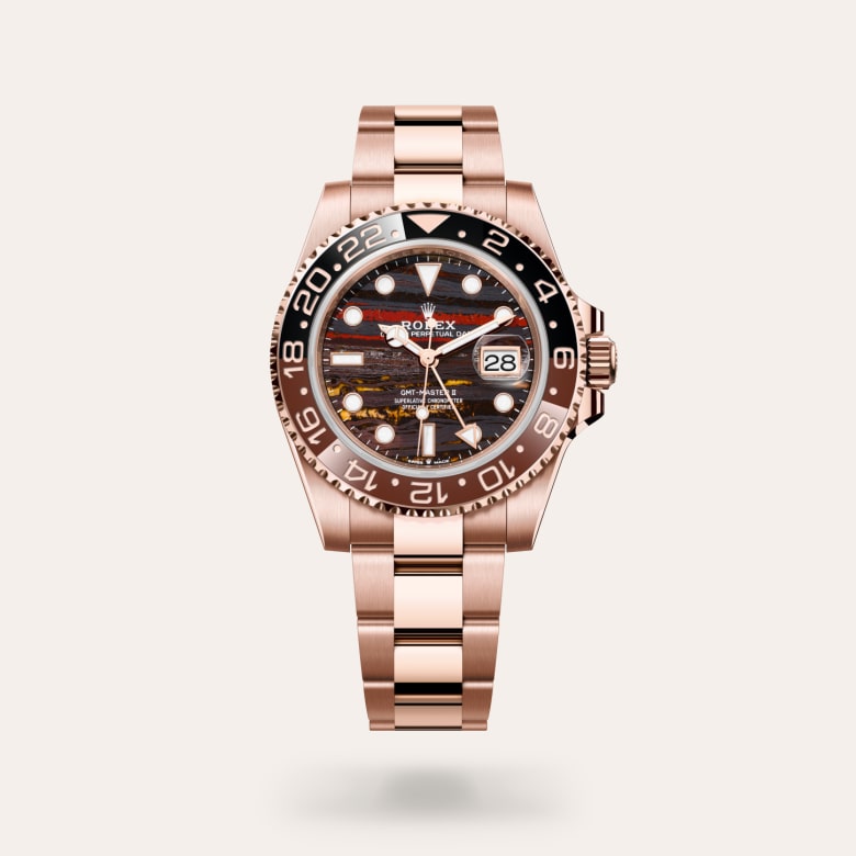 Rolex GMT-Master II [M126715CHNR-0002] in 18 ct everose gold with a tiger iron dial, bidirectional rotatable 24-hour graduated bezel. two-colour brown and black cerachrom insert in ceramic, moulded numerals and graduations bezel, and 18 ct everose gold bracelet.