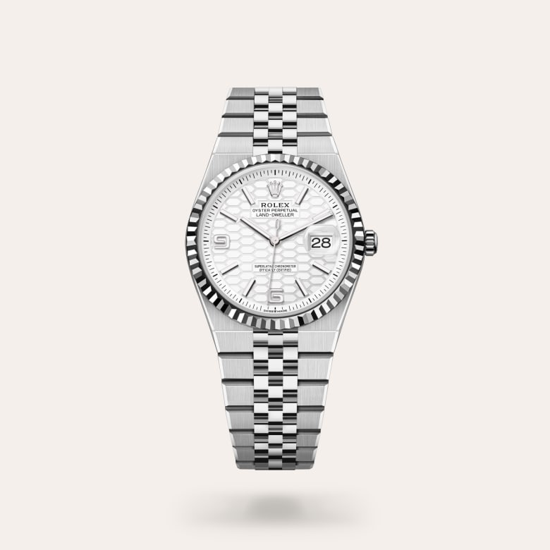 Rolex Land-Dweller 36 [M127234-0001] in white rolesor - combination of oystersteel and white gold with a intense white, honeycomb motif dial, fluted bezel, and oystersteel bracelet.