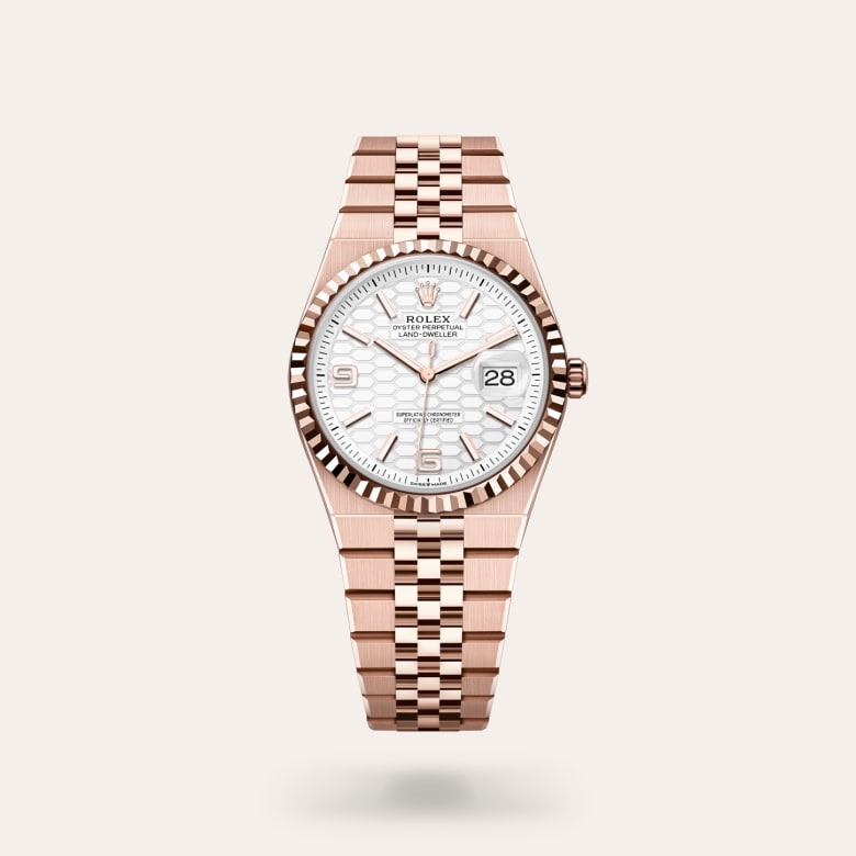 Rolex Land-Dweller 36 [M127235-0001] in 18 ct everose gold with a intense white, honeycomb motif dial, fluted bezel, and 18 ct everose gold bracelet.