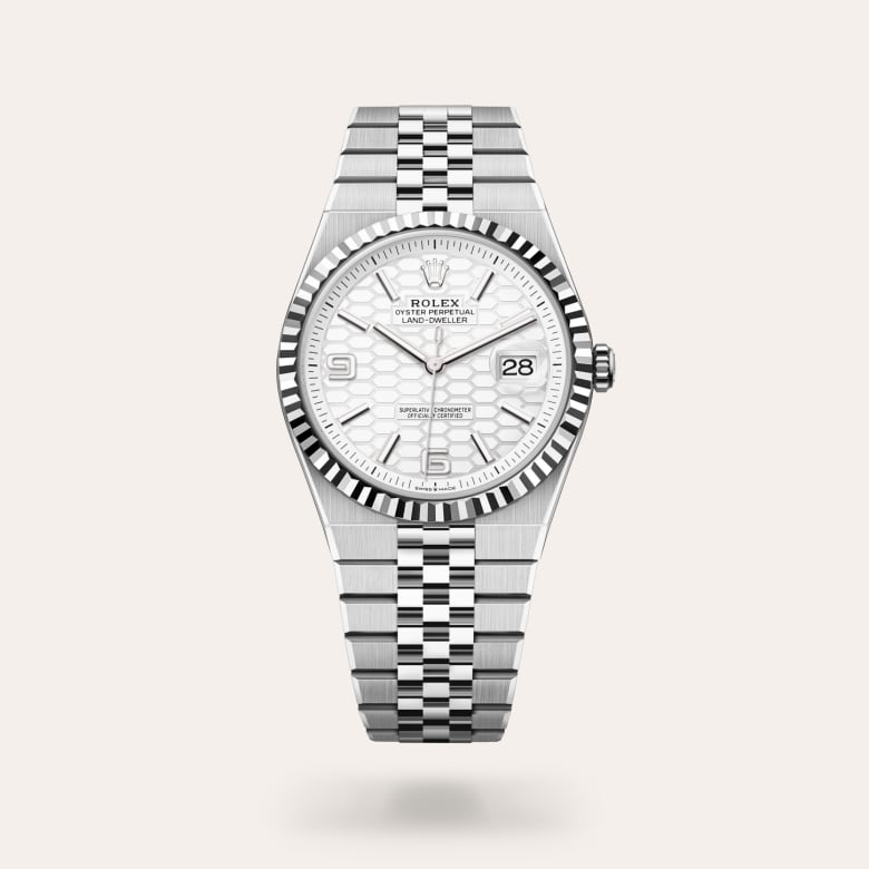 Rolex Land-Dweller 40 [M127334-0001] in white rolesor - combination of oystersteel and white gold with a intense white, honeycomb motif dial, fluted bezel, and oystersteel bracelet.