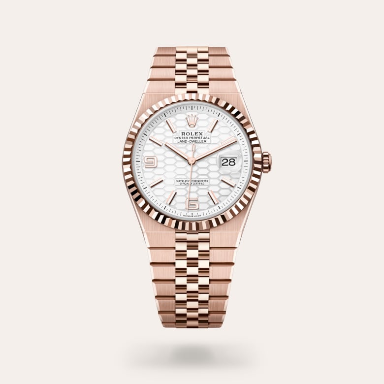 Rolex Land-Dweller 40 [M127335-0001] in 18 ct everose gold with a intense white, honeycomb motif dial, fluted bezel, and 18 ct everose gold bracelet.
