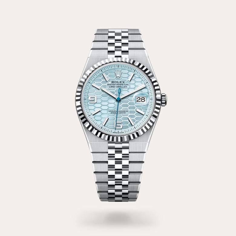 Rolex Land-Dweller 40 [M127336-0001] in platinum with a ice blue, honeycomb motif dial, fluted bezel, and platinum bracelet.