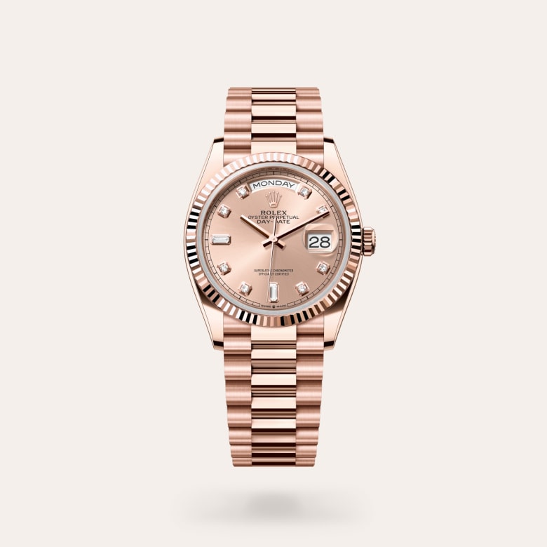 Rolex Day-Date 36 [M128235-0009] in 18 ct everose gold with a rosé-colour set with diamonds dial, fluted bezel, and 18 ct everose gold bracelet.