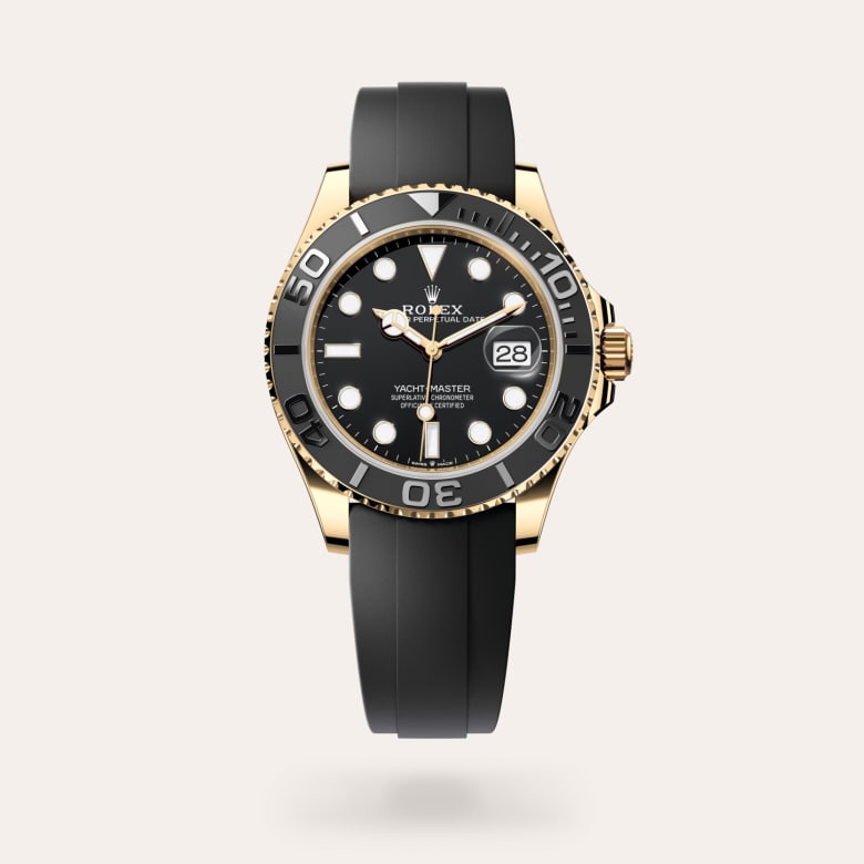 Rolex Yacht-Master 42 [M226658-0001] in 18 ct yellow gold with a black dial, bidirectional rotatable 60-minute graduated bezel with matt black cerachrom insert in ceramic, polished raised numerals and graduations bezel, and flexible metal blades overmoulded with high-performance elastomer bracelet.
