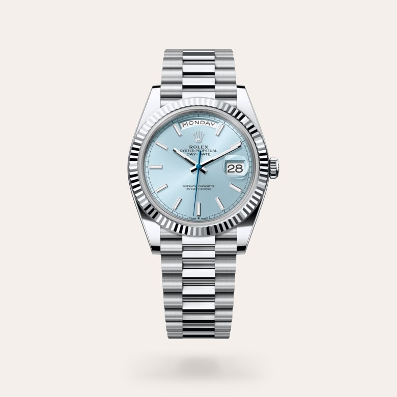 Rolex Day-Date 40 [M228236-0018] in platinum with a ice blue dial, fluted bezel, and platinum bracelet.