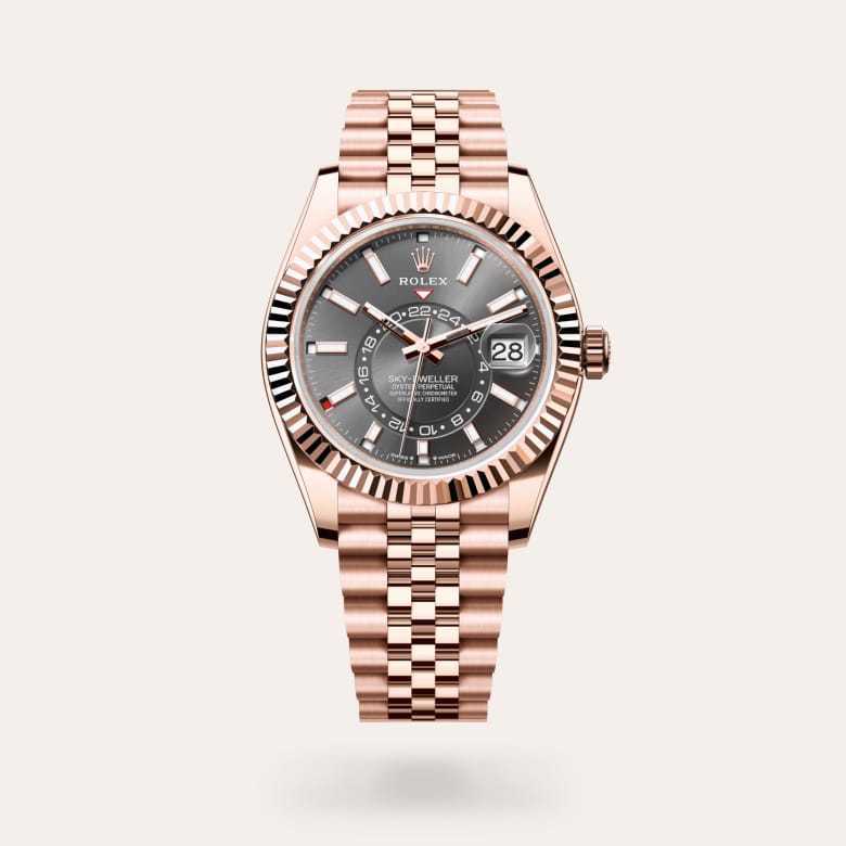Rolex Sky-Dweller [M336935-0008] in 18 ct everose gold with a slate dial, fluted, bidirectional rotatable rolex ring command bezel, and 18 ct everose gold bracelet.