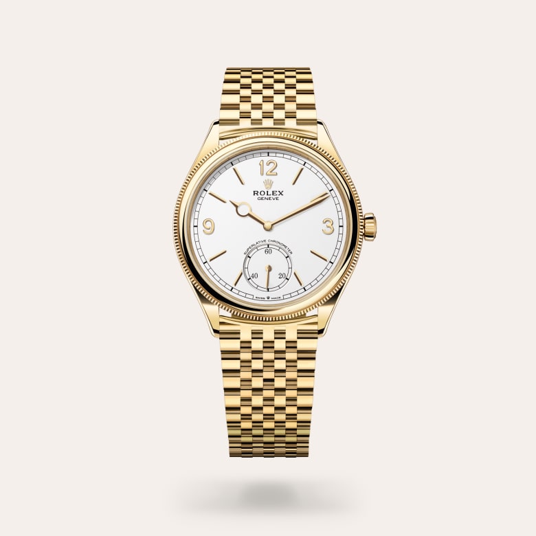 Rolex 1908 [M52508-0008] in 18 ct yellow gold with a intense white dial, domed and fluted bezel, and 18 ct yellow gold bracelet.