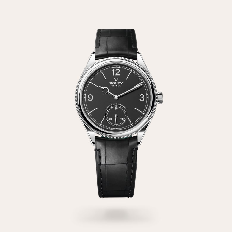 Rolex 1908 [M52509-0002] in 18 ct white gold with a intense black dial, domed and fluted bezel, and matt black alligator leather bracelet.