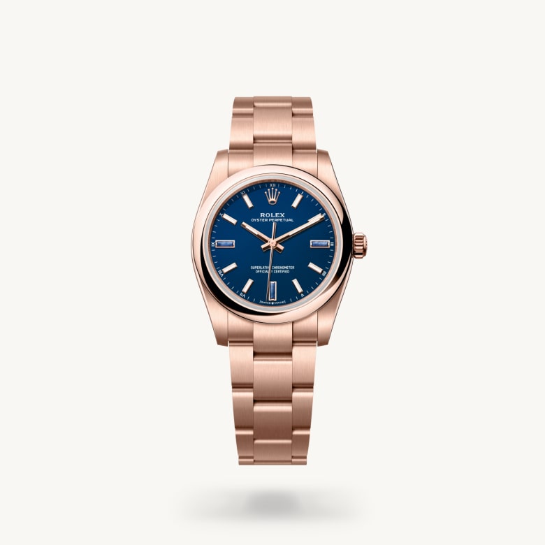 Rolex Oyster Perpetual 34 [M124205-0002] in 18 ct everose gold with a blue stone dial, domed bezel, and 18 ct everose gold bracelet - Kirk Freeport
