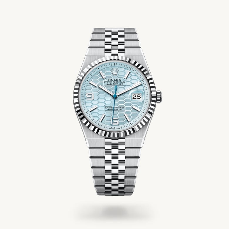 Rolex Land-Dweller 40 [M127336-0001] in platinum with a ice blue, honeycomb motif dial, fluted bezel, and platinum bracelet - Kirk Freeport