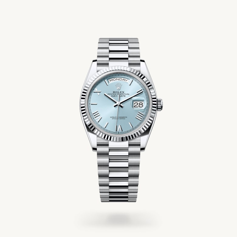 Rolex Day-Date 36 [M128236-0018] in platinum with a ice blue dial, fluted bezel, and platinum bracelet - Kirk Freeport