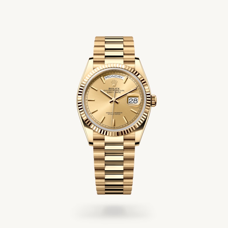 Rolex Day-Date 36 [M128238-0045] in 18 ct yellow gold with a champagne-colour dial, fluted bezel, and 18 ct yellow gold bracelet - Kirk Freeport
