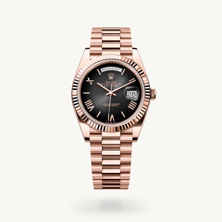 Rolex Day-Date 40 [M228235-0055] in 18 ct everose gold with a slate ombré dial, fluted bezel, and 18 ct everose gold bracelet - Kirk Freeport