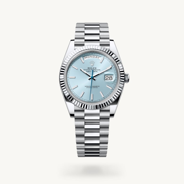 Rolex Day-Date 40 [M228236-0018] in platinum with a ice blue dial, fluted bezel, and platinum bracelet - Kirk Freeport
