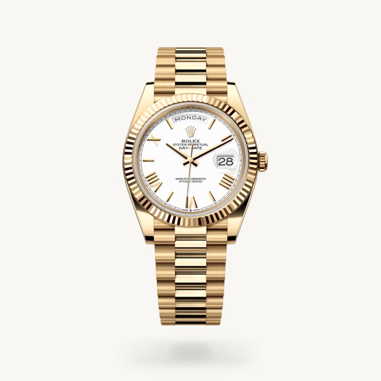 Rolex Day-Date 40 [M228238-0042] in 18 ct yellow gold with a white dial, fluted bezel, and 18 ct yellow gold bracelet - Kirk Freeport