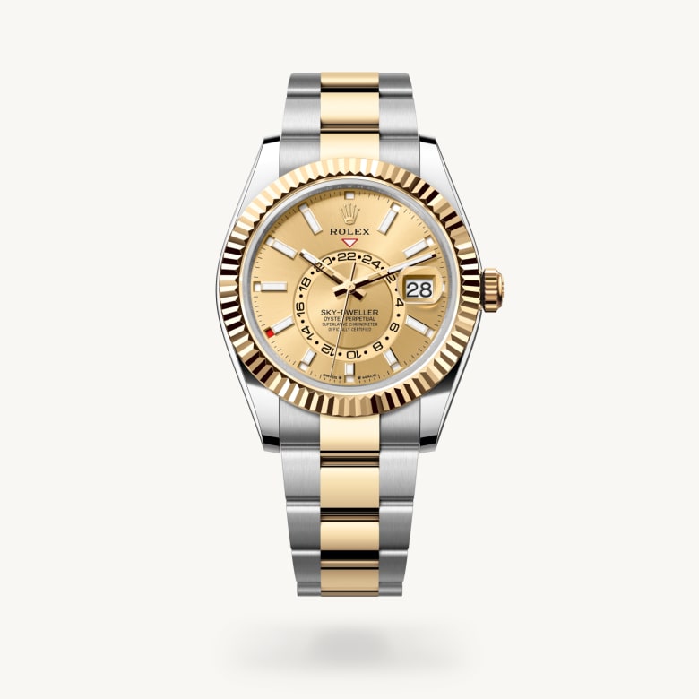 Rolex Sky-Dweller [M336933-0001] in yellow rolesor - combination of oystersteel and yellow gold with a champagne-colour dial, fluted, bidirectional rotatable rolex ring command bezel, and yellow rolesor - combination of oystersteel and yellow gold bracelet - Kirk Freeport