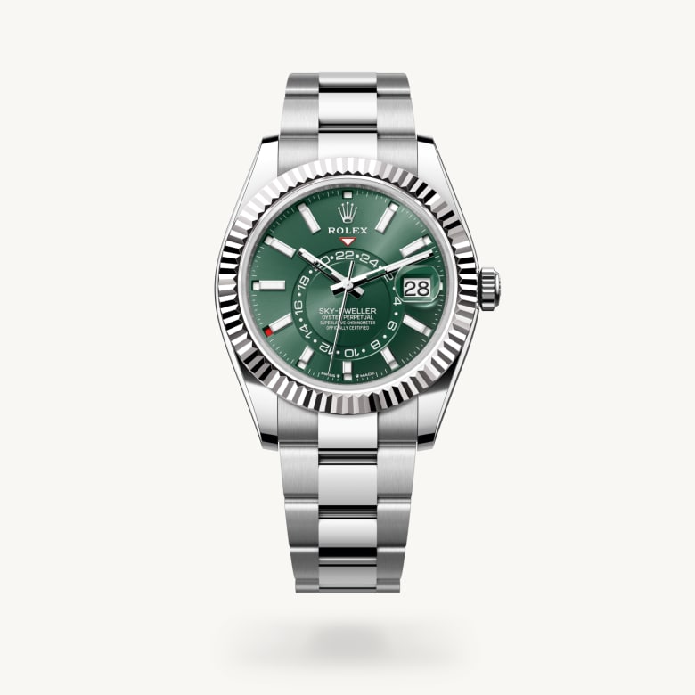 Rolex Sky-Dweller [M336934-0001] in white rolesor - combination of oystersteel and white gold with a mint green dial, fluted, bidirectional rotatable rolex ring command bezel, and oystersteel bracelet - Kirk Freeport
