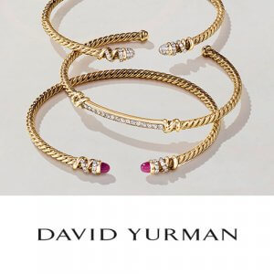 David Yurman three gold bracelets with diamonds embedded