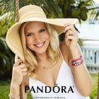 Kirk Freeport Pandora Early Access Event woman wearing a hat displaying several bracelets