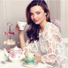 Miranda Kerr for Royal Albert at Kirk Freeport in Grand Cayman woman drinking tea from an elegant china set