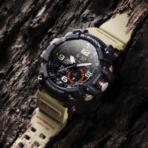 Black Casio G-Shock watch with beige wristband at Kirk Freeport in Grand Cayman