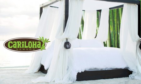 Cariloha Bamboo Luxury bed on a beach