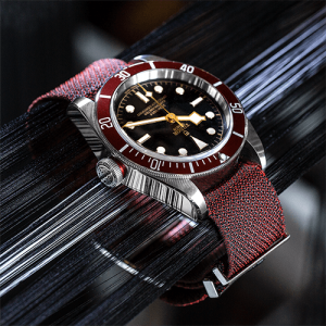 Tudor Watches metallic grey and maroon watches