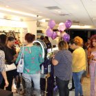 Urban Decay Launch Event busy store interior with people using samples