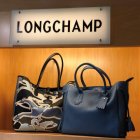Kirk Freeport Big Longchamp sale 2019 handbag display