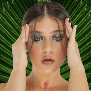 Shaina B. Miami woman applying makeup like eyeliner and eyeshadow
