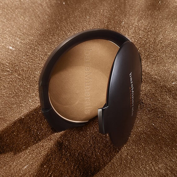 bareMinerals foundation with textured soil around it