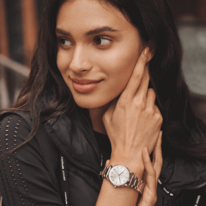 DKNY Watches woman wearing an elegant rose gold watch