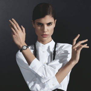 Armani watch displayed on a model crossing their arms
